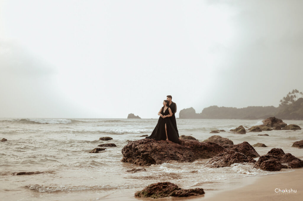 Pre-wedding image of a beautiful couple on a beach picture captured by the best pre-wedding photographer in Delhi.