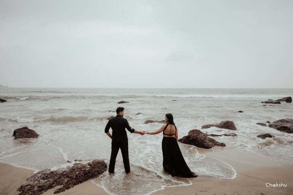 Couple on a beach Romantic pre-wedding moment captured by the best pre-wedding photographer in Delhi