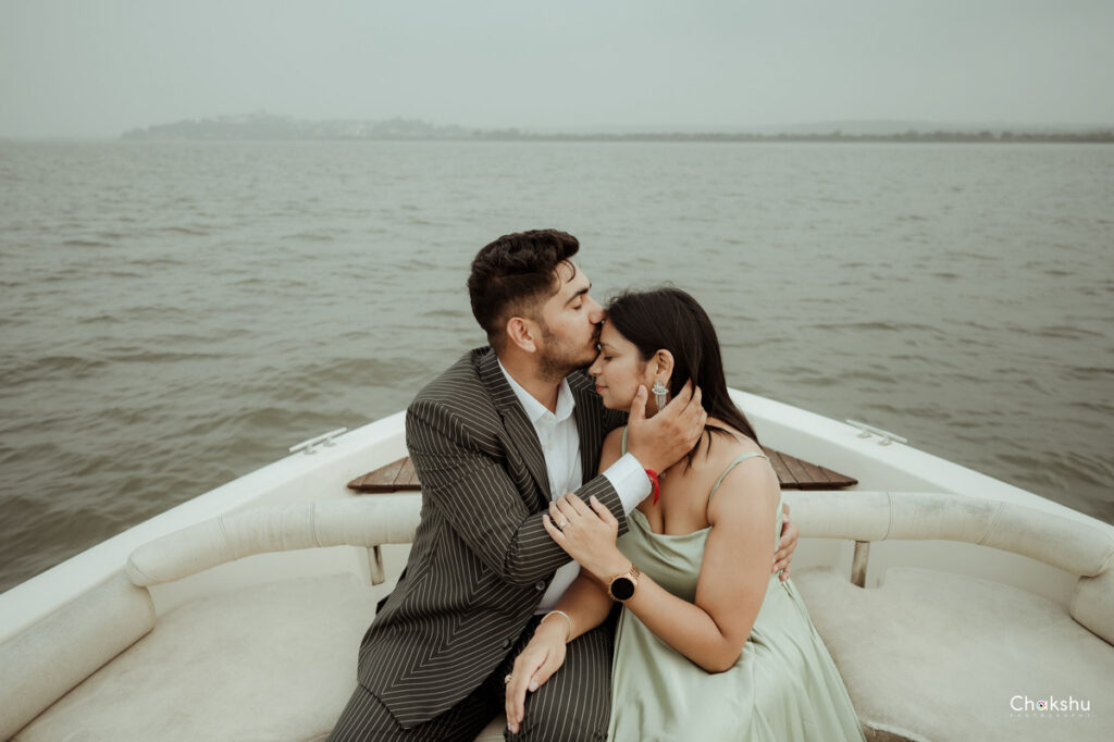 A beautiful couple picture kissing on forehead captured by wedding photographer in Delhi/NCR.